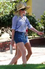 KIRSTEN DUNST in Denim Shorts Out Shopping in Los Angeles