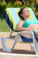 KYM MARSH in Bikini at a Pool in Portugal