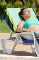 KYM MARSH in Bikini at a Pool in Portugal