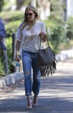 LEANN RIMES in jeans Arrives at Warner Brothers Studios in Los Angeles