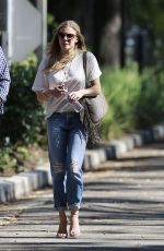 LEANN RIMES in jeans Arrives at Warner Brothers Studios in Los Angeles