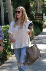 LEANN RIMES in jeans Arrives at Warner Brothers Studios in Los Angeles