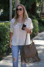 LEANN RIMES in jeans Arrives at Warner Brothers Studios in Los Angeles