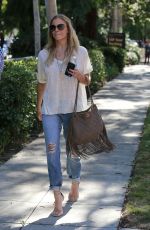 LEANN RIMES in jeans Arrives at Warner Brothers Studios in Los Angeles