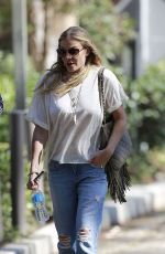 LEANN RIMES in jeans Arrives at Warner Brothers Studios in Los Angeles