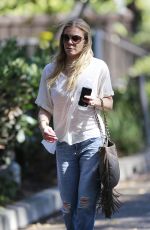 LEANN RIMES in jeans Arrives at Warner Brothers Studios in Los Angeles