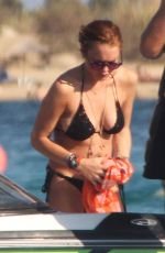 LINDSAY LOHAN in Bikini Jetskiing in Greece