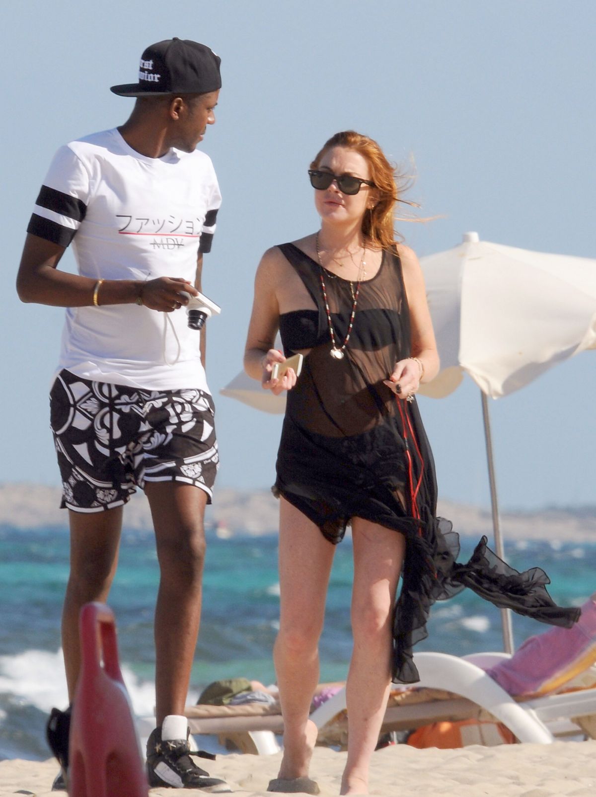LINDSAY LOHAN on the Beach in Ibizza LINDSAY LOHAN on the Beach in Ibizza
