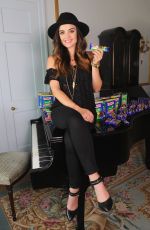 LUCY HALE at Nestle Crunch Girl Scout Candy Bars Promotion