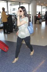 LUCY LIU Arrives at LAX Airport in Los Angeles
