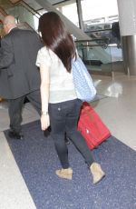 LUCY LIU Arrives at LAX Airport in Los Angeles