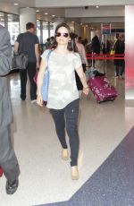 LUCY LIU Arrives at LAX Airport in Los Angeles