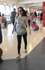 LUCY LIU Arrives at LAX Airport in Los Angeles