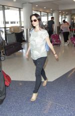 LUCY LIU Arrives at LAX Airport in Los Angeles