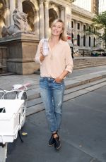 MARIA SHARAPOVA Serves Up Evian Bottle Service in New York