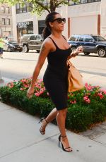 MELANIE BROWN Leaves Her Hotel in New York