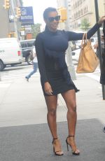 MELANIE BROWN Leaves Her Hotel in New York