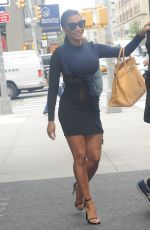 MELANIE BROWN Leaves Her Hotel in New York