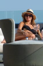 MILLIE MACKINTOSH in Bikini at a Pool in Ibiza