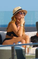 MILLIE MACKINTOSH in Bikini at a Pool in Ibiza