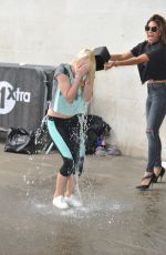 NICOLE SCHERZINGER Doses a Fan with Iced Water for Charity