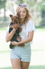 OLIVIA HOLT Walks Her Dog at a Park in Los Amgeles