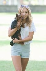 OLIVIA HOLT Walks Her Dog at a Park in Los Amgeles