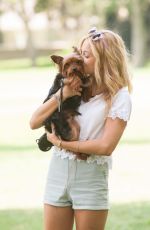 OLIVIA HOLT Walks Her Dog at a Park in Los Amgeles