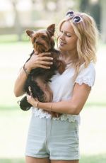 OLIVIA HOLT Walks Her Dog at a Park in Los Amgeles