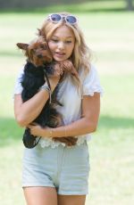 OLIVIA HOLT Walks Her Dog at a Park in Los Amgeles