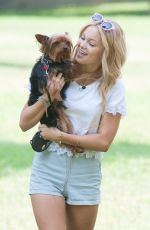 OLIVIA HOLT Walks Her Dog at a Park in Los Amgeles