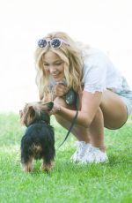 OLIVIA HOLT Walks Her Dog at a Park in Los Amgeles