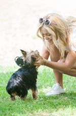 OLIVIA HOLT Walks Her Dog at a Park in Los Amgeles