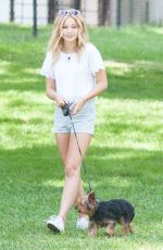 OLIVIA HOLT Walks Her Dog at a Park in Los Amgeles