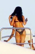 RIHANNA in Bikini at a Boat in Sicily