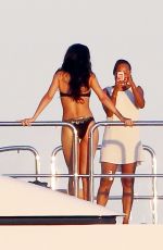 RIHANNA in Bikini at a Boat in Sicily