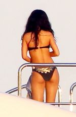 RIHANNA in Bikini at a Boat in Sicily