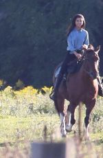 SELENA GOMEZ and Justin Bieber at Gorseback Riding in Canada