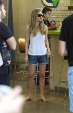 AMANDA SEYFRIED Arrives at Earth Bar in West Hollywood