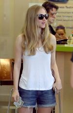 AMANDA SEYFRIED Arrives at Earth Bar in West Hollywood