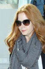 AMY ADAMS in Jeans Arrives at LAX Airport in Los Angeles