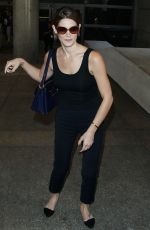 ASHLEY GREENE Arrivies at Los Angeles International Airport