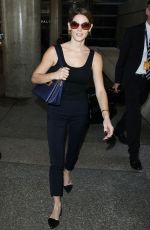 ASHLEY GREENE Arrivies at Los Angeles International Airport
