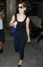 ASHLEY GREENE Arrivies at Los Angeles International Airport