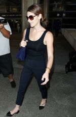 ASHLEY GREENE Arrivies at Los Angeles International Airport
