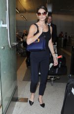 ASHLEY GREENE Arrivies at Los Angeles International Airport