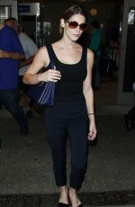 ASHLEY GREENE Arrivies at Los Angeles International Airport