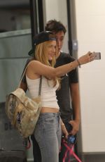 BELLA THORNE in Jeans Arrives at LAX Airport