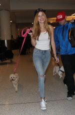BELLA THORNE in Jeans Arrives at LAX Airport
