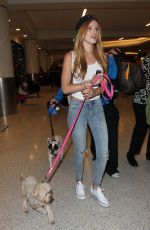 BELLA THORNE in Jeans Arrives at LAX Airport